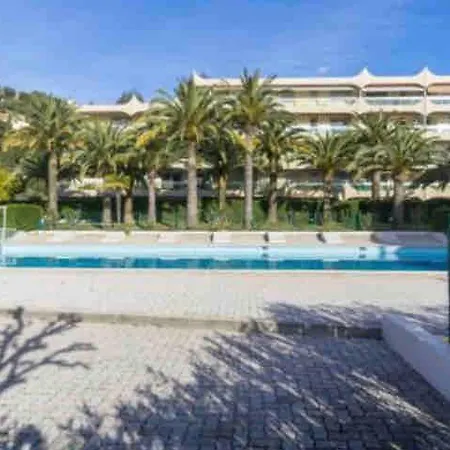In A Setting With Pool And Parking Apartment